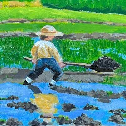 Farmer in rice field