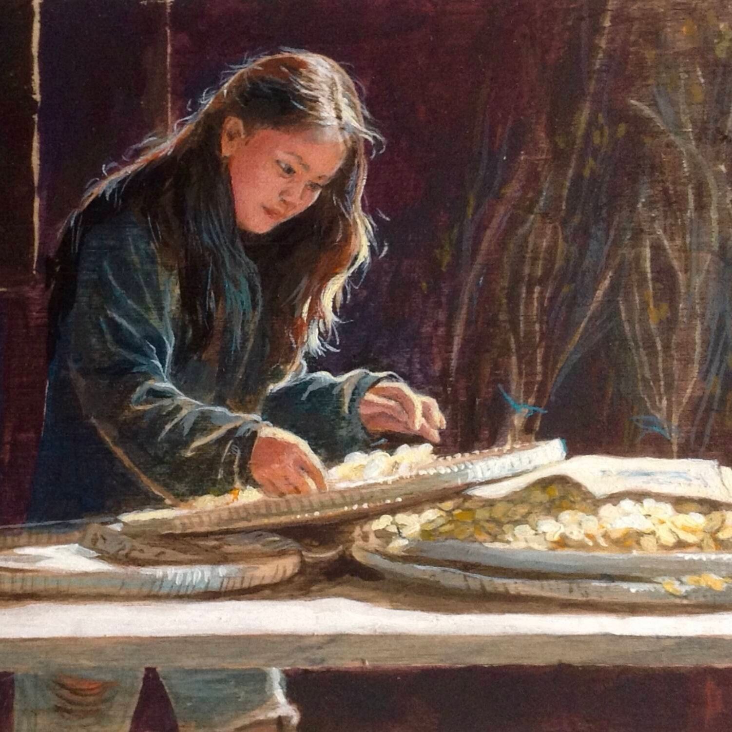 Sorting silk cocoons in Cambodia