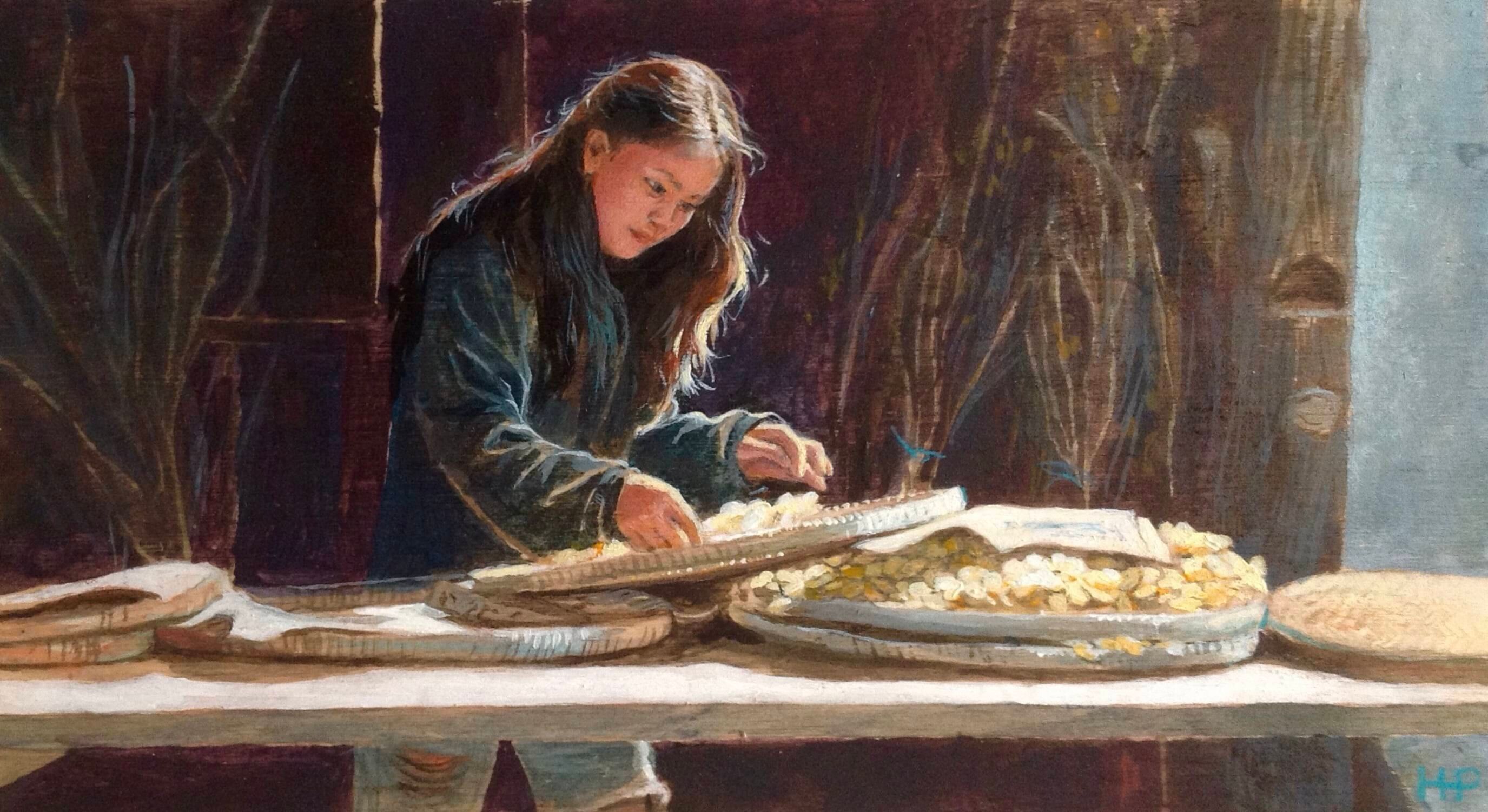 Sorting silk cocoons in Cambodia
